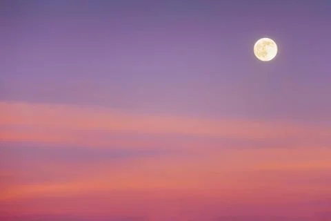 Full moon with sunset clouds Stock Photos