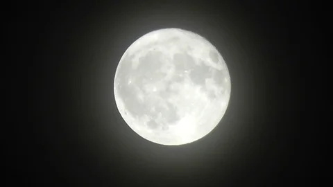 Full moon through a heatwave Stock Footage 92480314