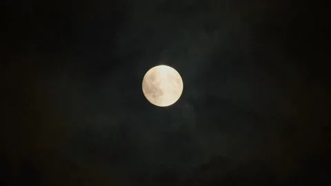 Full Moon Through Thin Hazy Clouds at Night Stock Footage 322111527