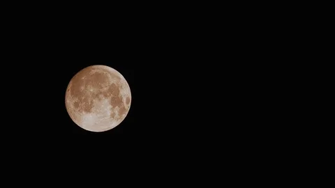 Full Moon time lapse across screen clouds pass by Stock Footage 95875421