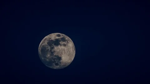 Full moon timelapse over blue sky Stockbeeldmateriaal 78530160