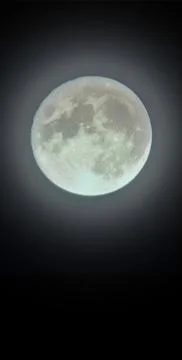 Full moon is a vertical banner or wallpaper for the screen. Night sky with moon Foto stock