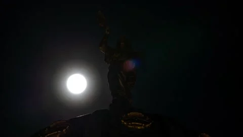 Full moon with view of statue on top French cathedral, Berlin 動画素材 145992887