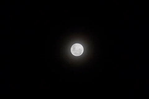 Full Moon visible in the sky. Stock Photos