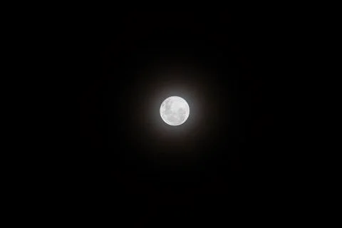 Full Moon visible in the sky. Stock Photos