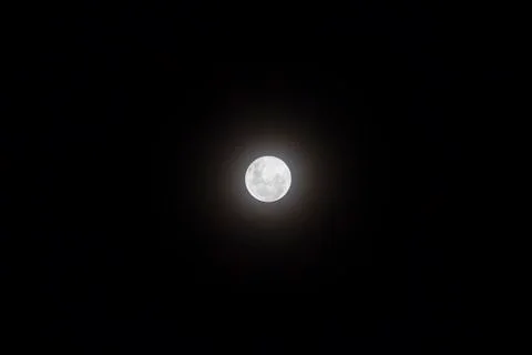 Full Moon visible in the sky. Stock Photos