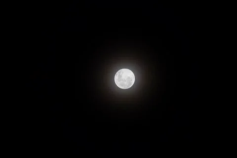Full Moon visible in the sky. Stock Photos