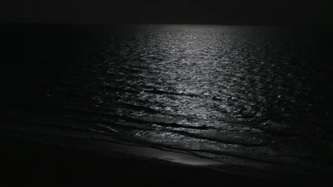Full moonlight reflecting in ocean water Video stock 146658860
