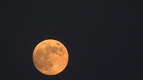 Full Orange Moon, time lapse, across sky 库存影片 25600779