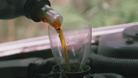 Full pouring oil into the engine 07 스톡 동영상 205532175