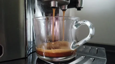 Full process of filling black fresh coffee from coffee machine Stock Footage 133095900