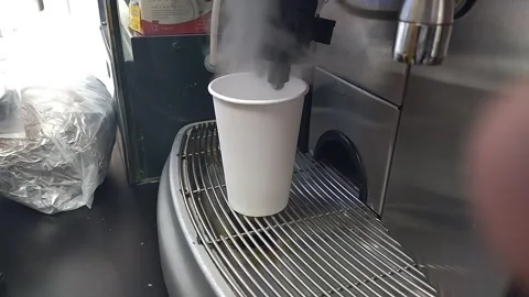 The full process of preparing a takeaway cappuccino Stock Footage 332609779