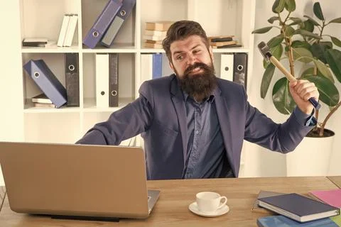 Full of rage. frustrated computer user. businessman express anger. ready to Stock Photos