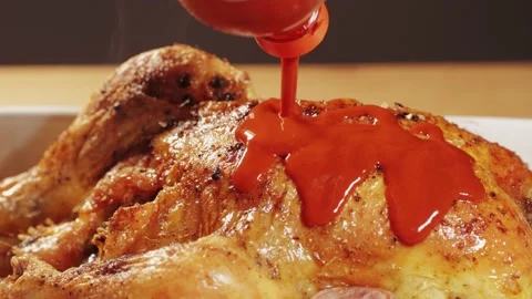 Full roasted grilled chicken meat in a frying pan with potatoes, cooked food Stock Footage 236159488
