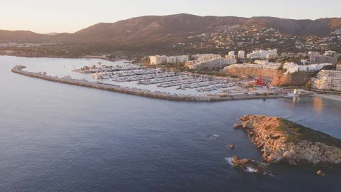 Full scale aerial orbit around the yacht harbour of Puerto Portals Stock Footage 101567369