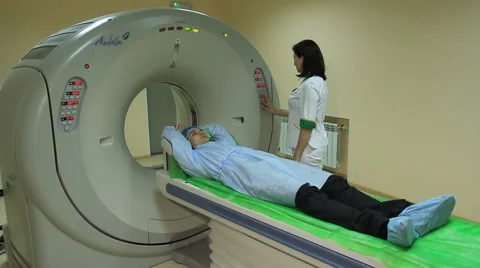 Full scanning process of man examination by MRI (Multiple shots in 1 footage) Stock Footage