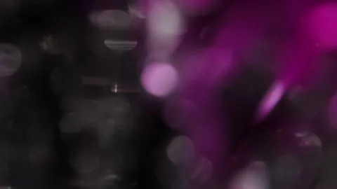 Full-screen animated white and colored crystal bokeh flaming reflections Vidéo 318058500