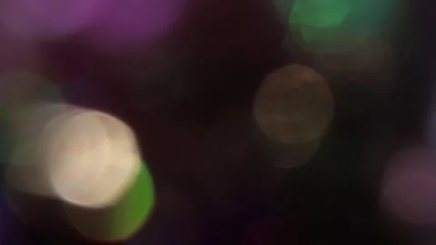 Full-screen bokeh flares in the dark 스톡 동영상 317459376