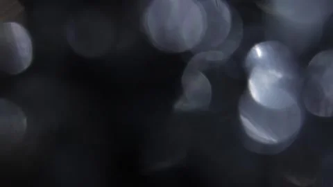 Full screen bokeh video with pale blue and white dynamic background moving left Vídeo Stock 317479953