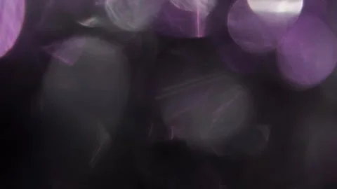 Full screen covered with large sparkling white and purple bokeh 스톡 동영상 318061452