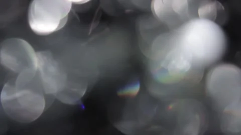 Full-screen crystal prism bokeh light leak in HD video Stock Footage 318362600