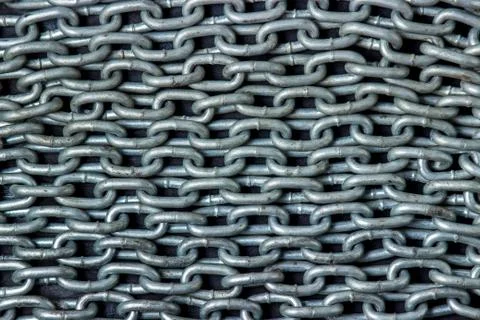 Full screen metal chain. Chains are in rows.  Stock Photos