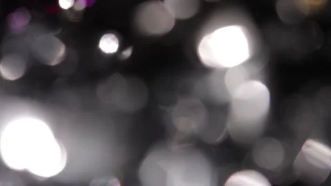 Full-screen silver crystal bokeh light leak and low color in HD video Stock Footage 318361795