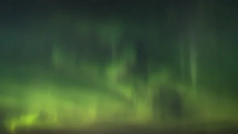 A full screen view of active green and yellow Aurora with a star filled sky  Stock Footage 149832666