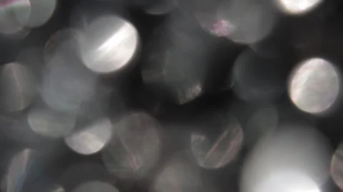 Full-screen white bokeh light flare in the black 스톡 동영상 318917605