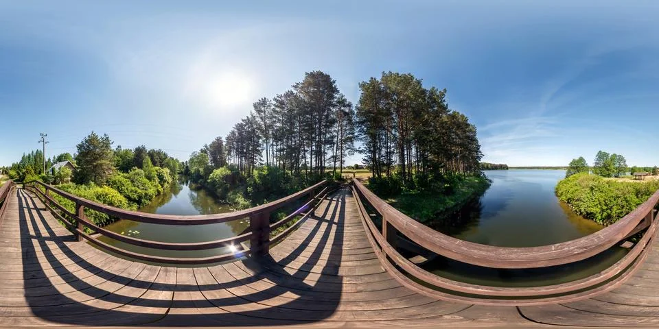 Full seamless panorama 360 by 180 angle view on wooden bridge across water Stock Photos