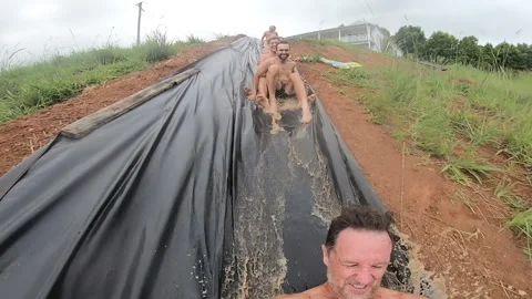 Full Send Down Massive Slip-n-Slide, Byron Bay, New South Wales, Australia Stock Footage 205204803