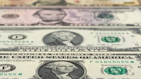 Full set of US dollar bills close up tracking. Slider shot, low angle. 4K Video stock 125518634