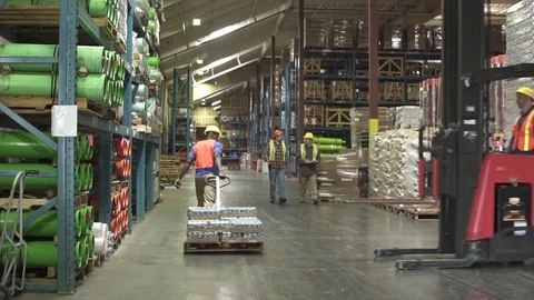 Full shot of a forklift driver transporting product 動画素材 76534690