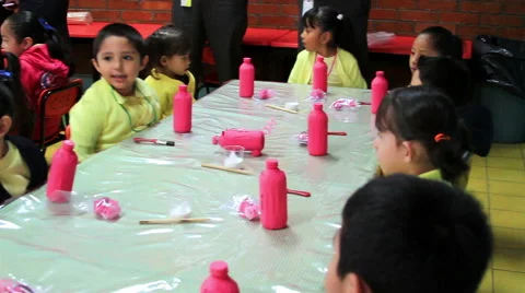 FULL SHOT-PAN LEFT. Children in a classroom in the kindergarten. Stock Footage 48416988