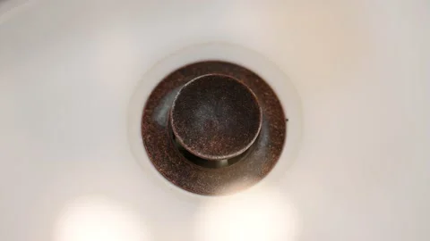Full sink of water with the drain opened until empty. Stock Footage 228798378