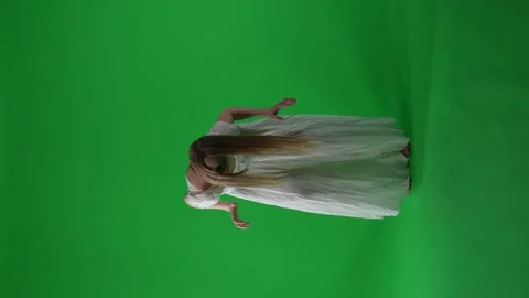 Full-size vertical green screen, chroma key video of a posessed female, woman Stock-Footage 249815292