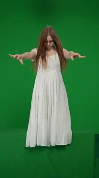 Full-size vertical green screen, chroma key shot of a posessed female, woman Stock Photos