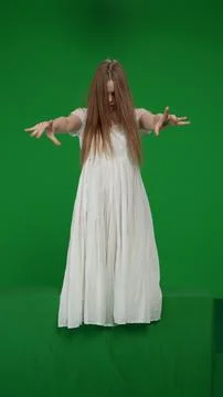 Full-size vertical green screen, chroma key shot of a posessed female, woman Stock Photos