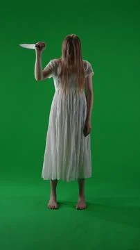 Full-size vertical green screen, chroma key shot of a posessed female, woman Stock Photos