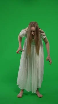 Full-size vertical green screen, chroma key shot of a posessed female, woman Stock Photos
