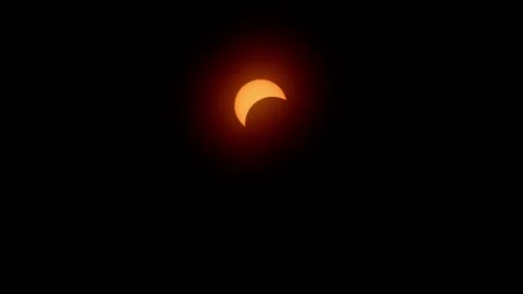 Full solar eclipse happening in real time afternoon at April 8 2024 Stock Footage 275751128
