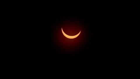 Full solar eclipse happening in real time afternoon at April 8 2024 Stock Footage 275751153