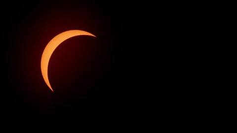 Full solar eclipse happening in real time afternoon at April 8 2024 Stock Footage 275751195
