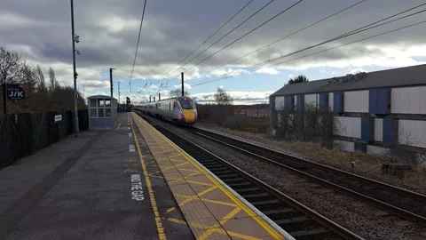 Full speed train through the train station Stock Footage 233826624