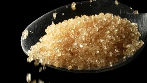 A full spoon of brown cane sugar. Stock Footage 235542777