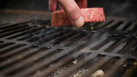 Full time lapse of burger cutlet cooking on the barbecue grill. Stock Footage 135396938