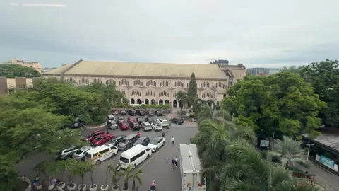 Full view of Baclaran Church compound from a moving train Manila 4K Vídeos de archivo 337980123