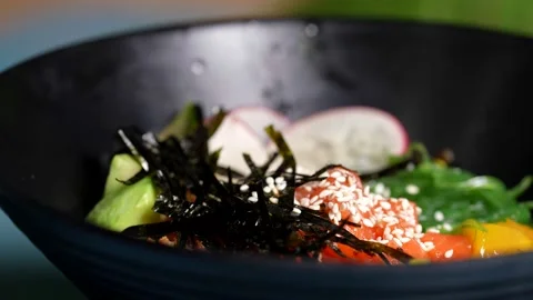 Full view of ramen bowl showcasing soy egg, tender beef slices, mushrooms  Stock Footage 310929686