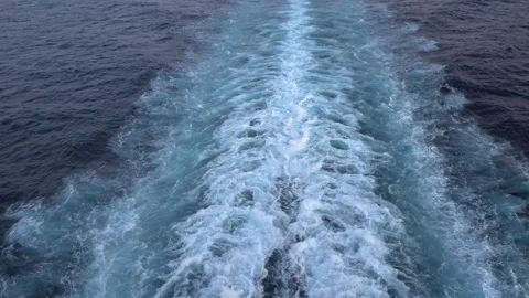 Full view of a ship sailing trail in the sea - Ship's wake Stock Footage 251743179