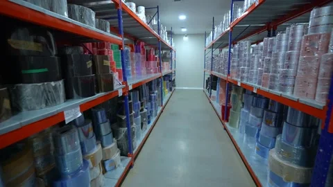 Full warehouse with packaging material for storage. Bulk store room in factory. Stock Footage 300254836
